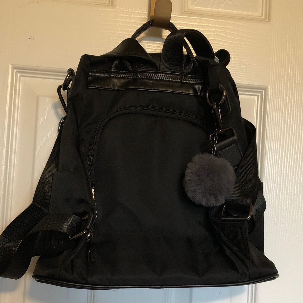 Stylish Black Backpack with Pom Pom
